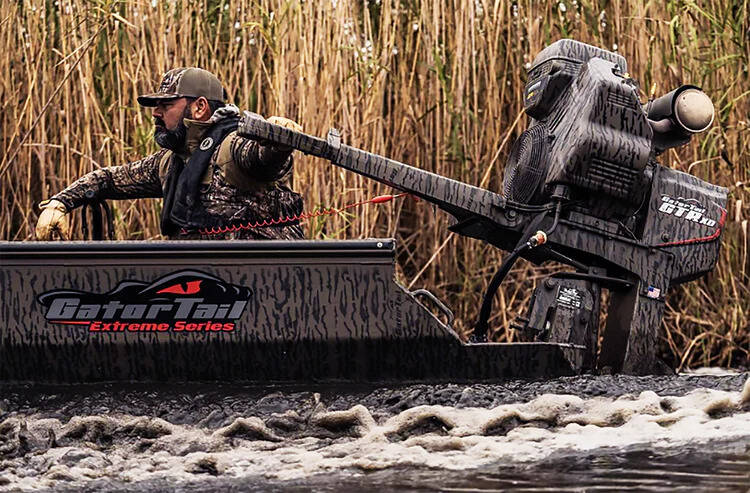 Boat navigating in low light with stern light visible