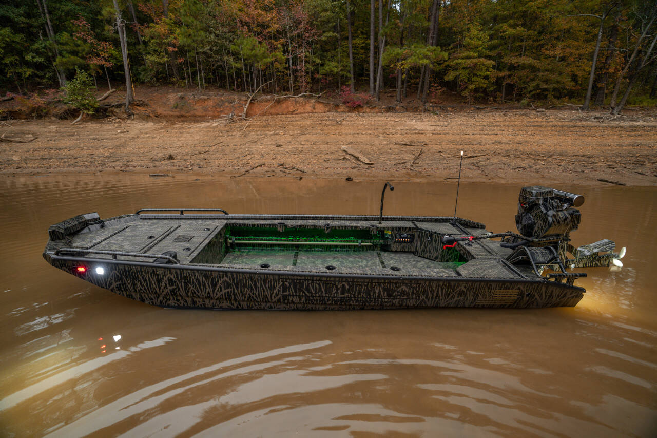 Boat on river during early or low-light conditions